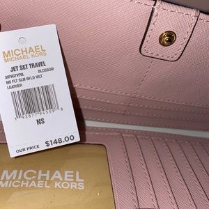 Cute and brand new purse with matching wallet!